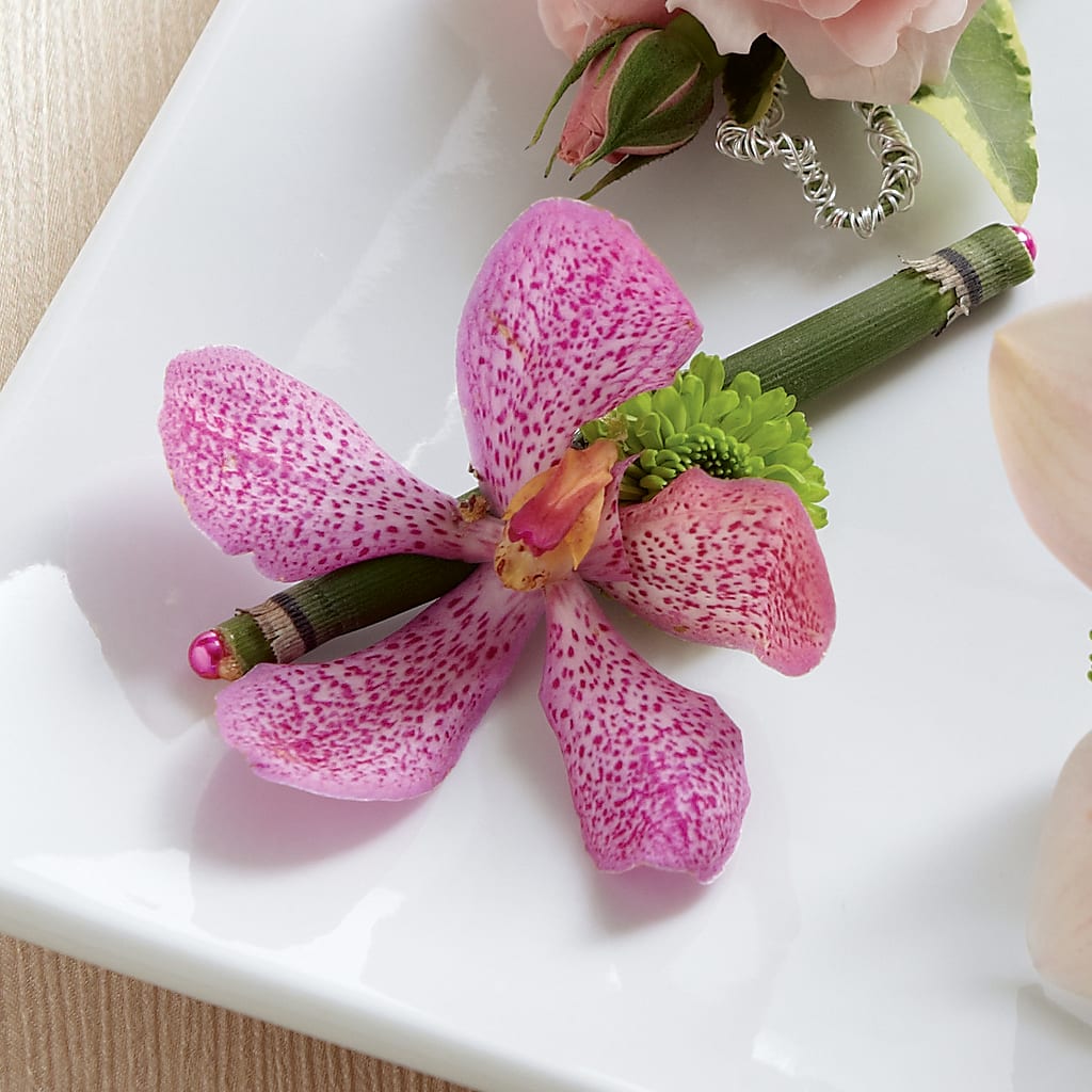 Pink Mokara Boutonniere – Guilles Flowers Santa Clara, San Jose CA
